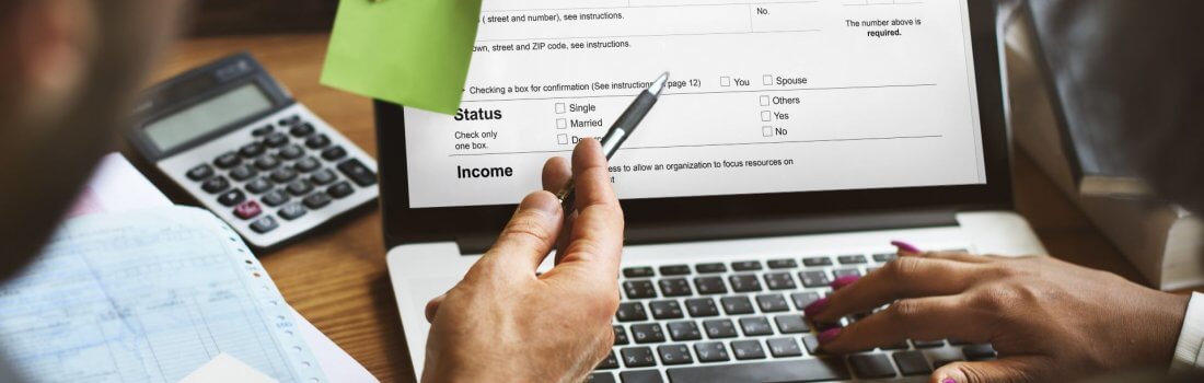 a person completing a tax return online